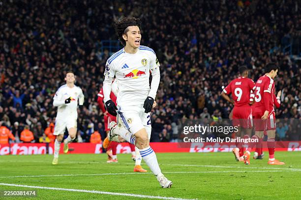 Ao Tanaka of Leeds United celebrates scoring his team's third goal during the Premier League match between Leeds United and Liverpool at Elland Road...