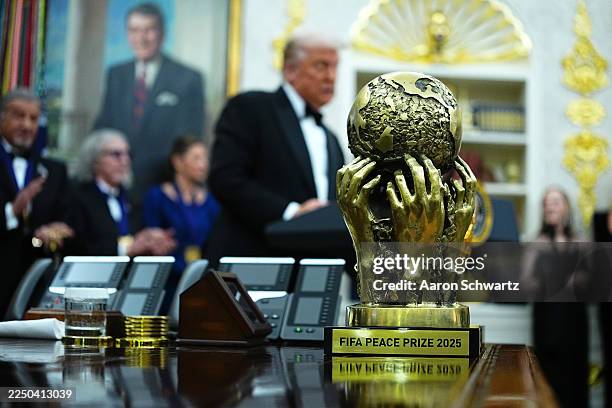 The FIFA 2025 Peace Prize sits on the Resolute Desk during a medal presentation ceremony with U.S. President Donald Trump for the 2025 Kennedy Center...