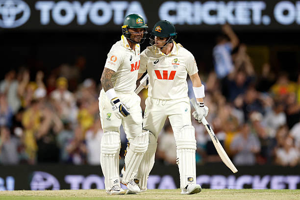 Steve Smith and Jake Weatherald of Australia embrace after Australian the Second 2025/26 Ashes Series Test Match between Australia and England at The...