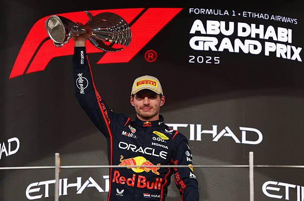 Race winner Max Verstappen of the Netherlands and Oracle Red Bull Racing lifts his trophy on the podium during the F1 Grand Prix of Abu Dhabi at Yas...