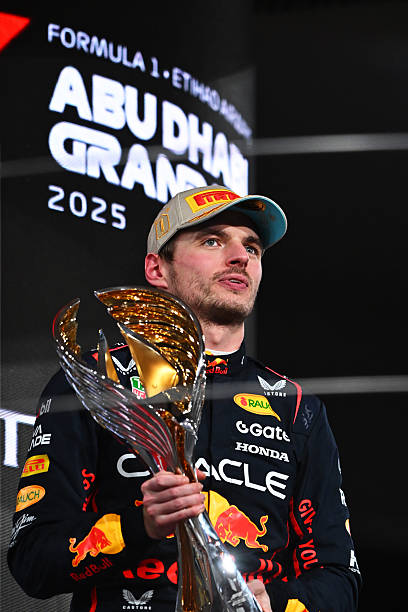 Race winner Max Verstappen of the Netherlands and Oracle Red Bull Racing lifts his trophy on the podium during the F1 Grand Prix of Abu Dhabi at Yas...