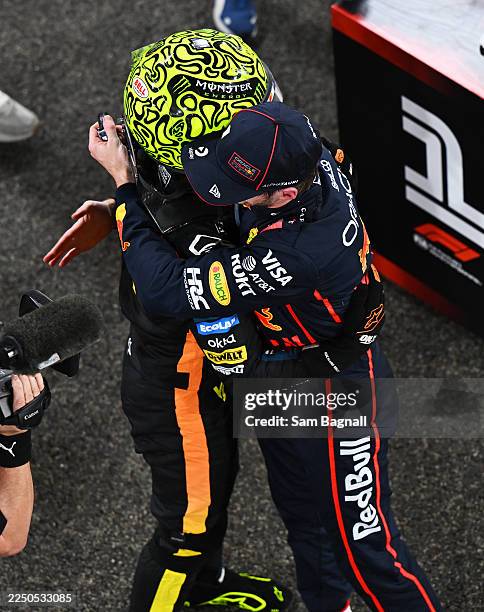 Race winner Max Verstappen of the Netherlands and Oracle Red Bull Racing congratulates 2025 F1 World Drivers Champion and Third placed Lando Norris...