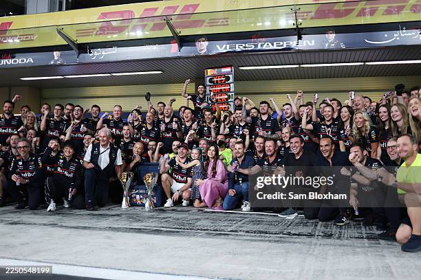 Race winner Max Verstappen of the Netherlands and Oracle Red Bull Racing celebrates with his team and family during the F1 Grand Prix of Abu Dhabi at...