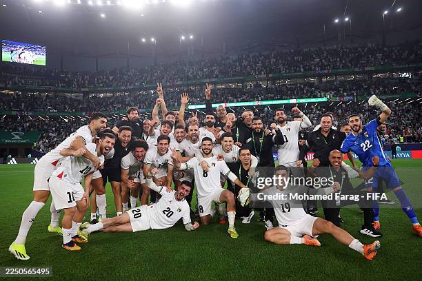 Syria. Play Palestine players celebrate after the draw as their team progresses ...