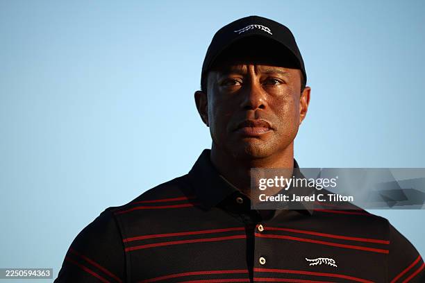 Tiger Woods of the United States stands on the 18th green for the trophy ceremony during the final round of the Hero World Challenge 2025 at Albany...
