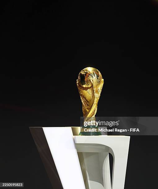 The FIFA World Cup Trophy is seen on stage during the FIFA World Cup 2026 Official Draw at John F. Kennedy Center for the Performing Arts on December...
