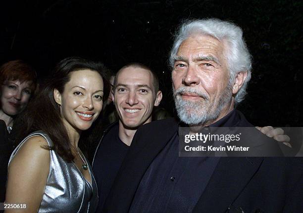James Coburn , his wife Paula and his agent, CAA's Jeremy Plager at CAA's post MTV Movie Awards party at Cafe Le Deux in Los Angeles, Ca. . 6/2/01....