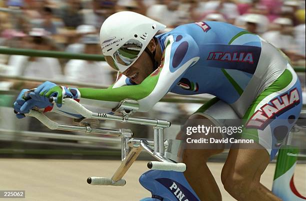 Andrea Collinelli of Italy in action during his gold medal ride in the mens individual pursuit at the Stone Mountain Velodrome at the 1996 Centennial...