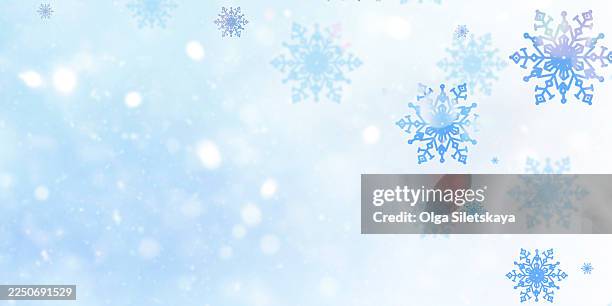 snowflakes on blue background - snow flakes falling stock pictures, royalty-free photos & images