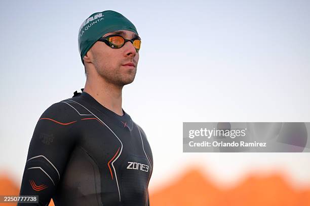 Athletes prepare to compete in the swim portion of the 2025 IRONMAN 70.3 La Quinta race on December 07, 2025 in La Quinta, California.