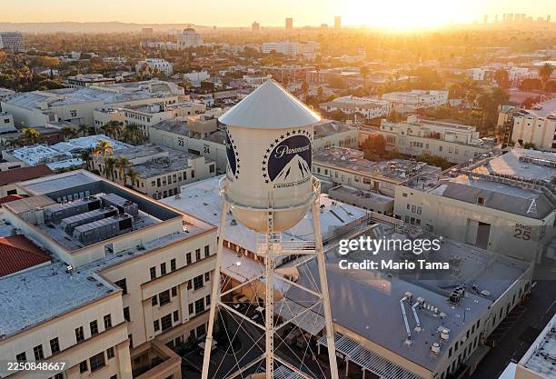 An aerial view of the Paramount logo on the water tower at Paramount Studios on December 8, 2025 in Los Angeles, California. Entertainment giant...