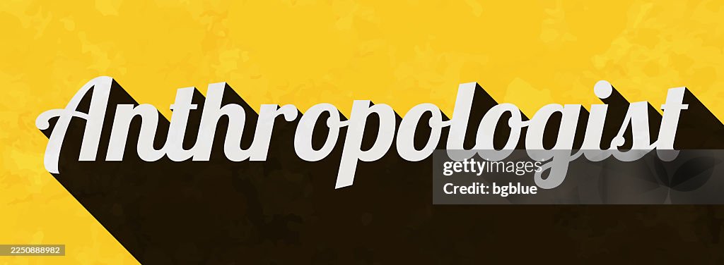 Anthropologist - Text with long shadow on textured yellow background