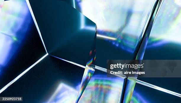 abstract glass prism refracting light dispersion on blue background - lichtbreking stockfoto's en -beelden