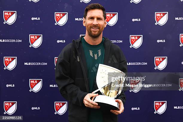 Lionel Messi of Inter Miami CF poses for a photo with the 2025 Landon Donovan MLS MVP trophy at Chase Stadium on December 09, 2025 in Fort...