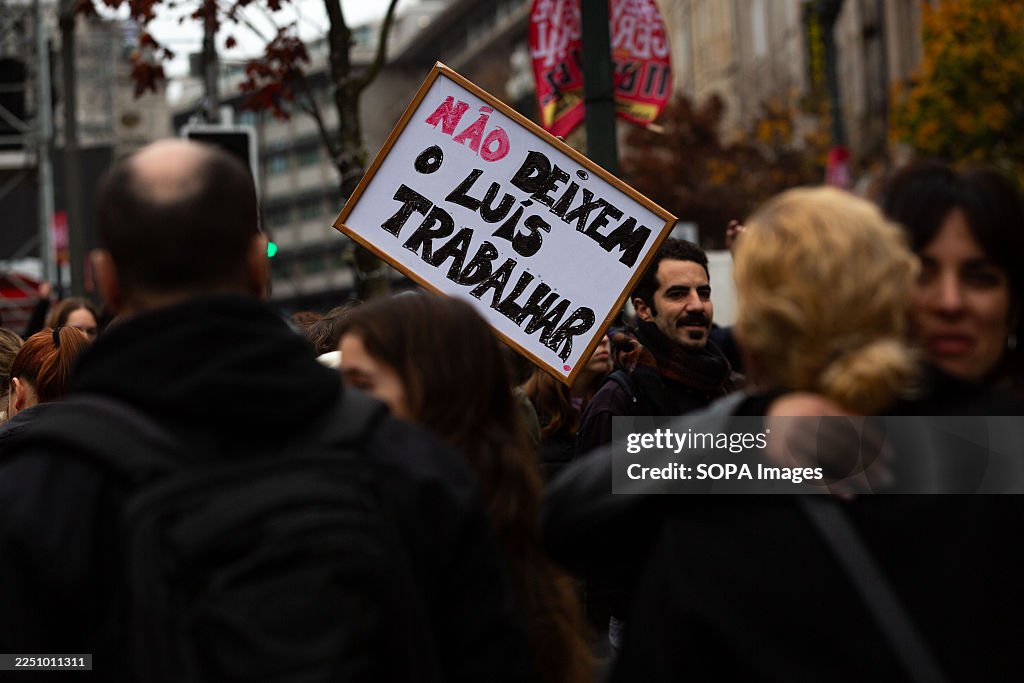 A protester holds a placard during the national general