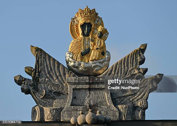 Close-up of a sculpted Black Madonna and child on top of a gate of the monastery of Jasna Gora, in Czestochowa, Silesian Voivodeship, Poland, on...