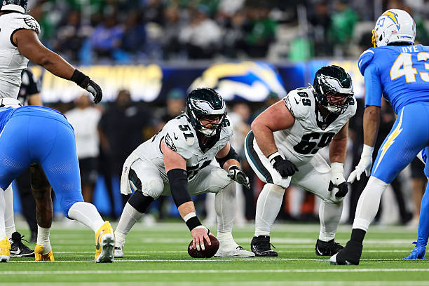 Cam Jurgens of the Philadelphia Eagles lines up before a play during the game against the Los Angeles Chargers at SoFi Stadium on December 8, 2025 in...