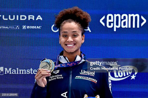 Sara Curtis of Italy shows the gold medal after competing in the 50m. Backstroke Men during the European Short Course Swimming Championships at Aqua...