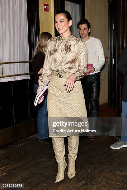 Dua Lipa and Mark Ronson attend Dua Lipa's "Service95 Book Club" with Mark Ronson at The Chelsea Hotel on December 09, 2025 in New York City.
