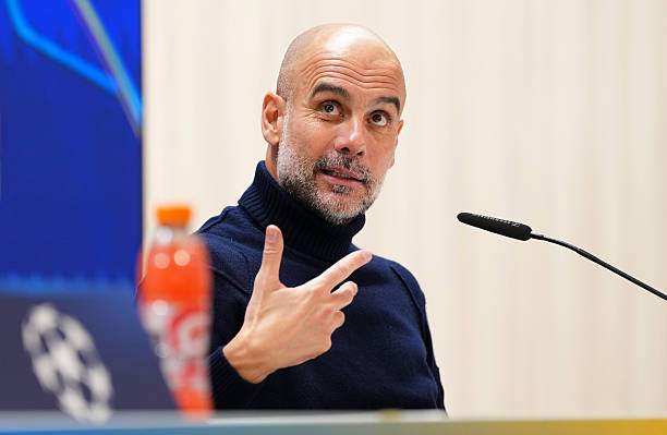 Pep Guardiola, Manager of Manchester City, speaks to the media in a post match press conference following the team's victory during the UEFA...