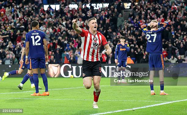 Dan Ballard celebrates after Nick Woltemade of Newcastle heads the ball into his own net during the Premier League match between Sunderland and...