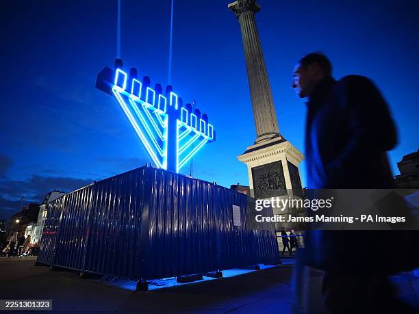 Menorah lit up in Trafalgar Square, central London, to mark the first day of Hanukkah. The Jewish festival of lights, also known as Chanukah, is...