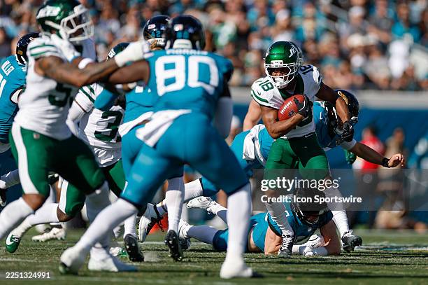 New York Jets wide receiver Isaiah Williams returns a punt during the game between the Jacksonville Jaguars and the New York Jets on December 14,...