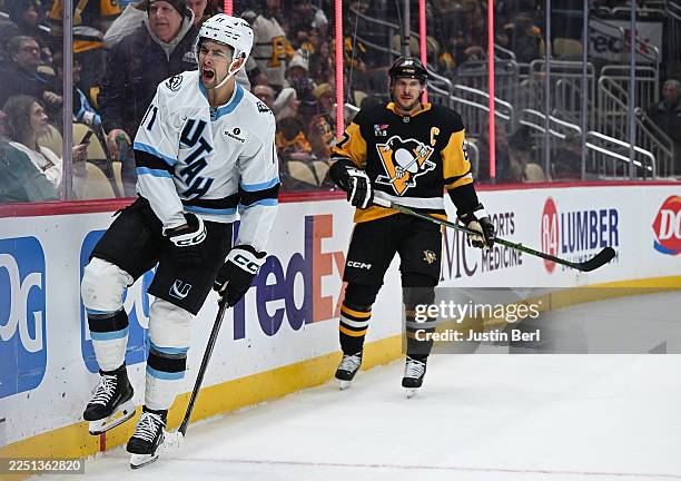 Dylan Guenther of the Utah Mammoth celebrates after scoring the game-winning goal in overtime to give the Mammoth a 5-4 win over the Pittsburgh...