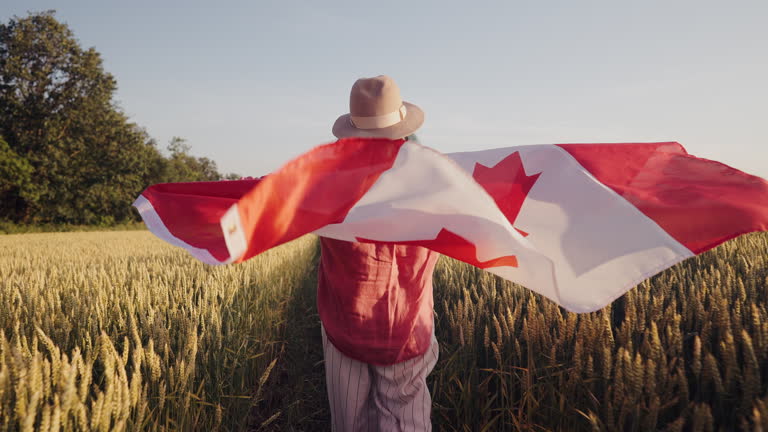 https://media.gettyimages.com/id/2251401405/video/canadian-patriot-woman-running-with-national-flag-on-field-red-maple-patriotic-spirit-symbol.jpg?b=1&s=640x640&k=20&c=WOKl12IY1iKJAqdxFqe-w27OcM0UjvJ3zXo_8Sivixo=