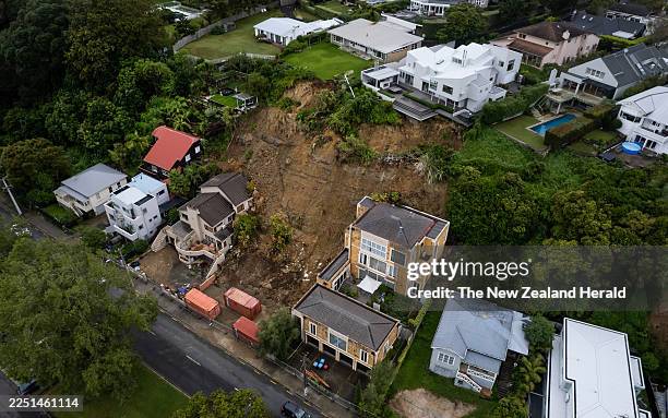 Shore Road, Remuera, homes that were Red Stickered after a land slide from the deluge of rain which caused extensive flooding and damage in the...