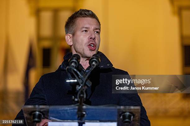 Peter Magyar, leader of the TISZA party delivers a speech at a demonstration in front of the presidential palace on December 13, 2025 in Budapest,...