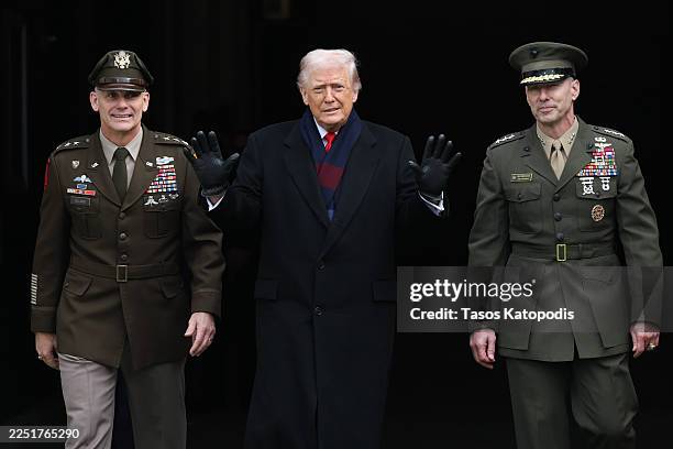 President Donald Trump walks onto the field for the 126th Army-Navy Game between the Army Black Knights and the Navy Midshipmen at M&T Bank Stadium...
