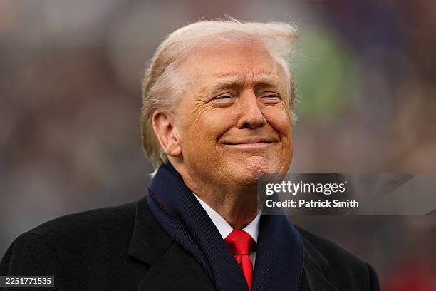 President Donald Trump smiles from the field before the 126th America's Game between the Army Black Knights and the Navy Midshipmen at M&T Bank...