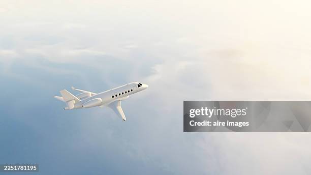 private jet flying above clouds with light flare - aereo privato foto e immagini stock