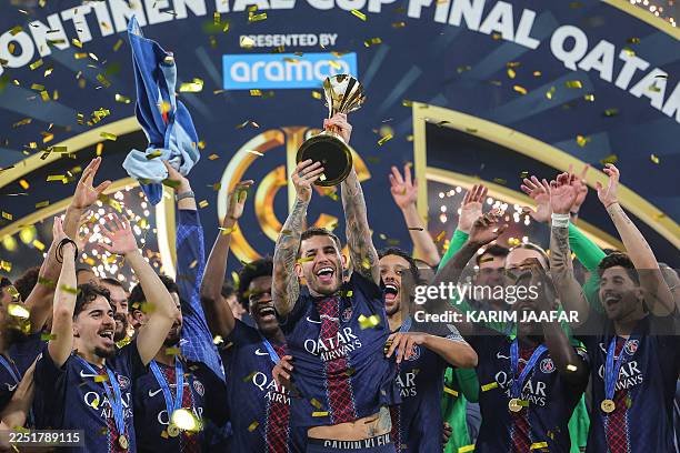 S players celebrate on the podium after winning the 2025 FIFA Intercontinental Cup final football match between Paris Saint-Germain and CR Flamengo...