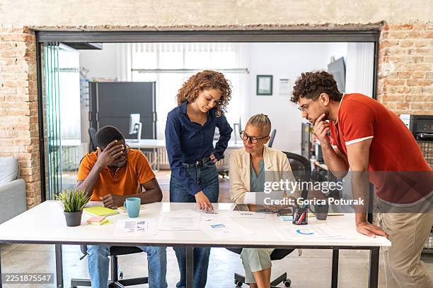 diverse business team collaborating during stressful office meeting - disappointment stock pictures, royalty-free photos & images