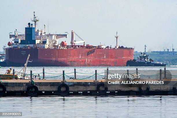 Crude oil tanker is anchored on Lake Maracaibo near Maracaibo, Zulia state, Venezuela, on December 18, 2025. Venezuela struck a defiant note on...