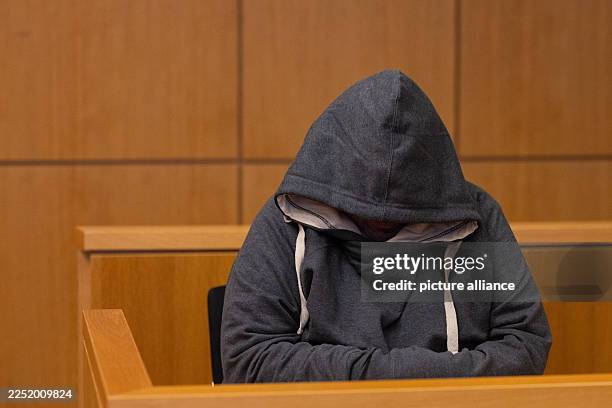 December 2025, North Rhine-Westphalia, Aachen: The defendant sits in a courtroom at the regional court. The verdict is expected in the trial against...