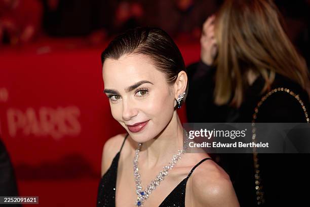 Lily Collins attends the "Emily In Paris" - Season Five - Netflix Paris Premiere at Le Grand Rex on December 15, 2025 in Paris, France.