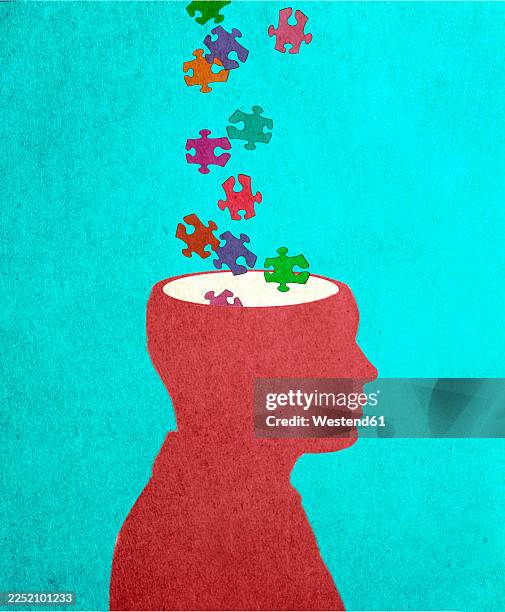 colorful puzzle pieces entering a human head representing creativity - memory problems stock illustrations