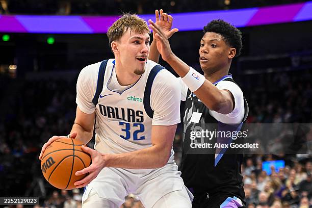 Cooper Flagg of the Dallas Mavericks looks to pass around Ace Bailey of the Utah Jazz during the second half of a game at Delta Center on December...