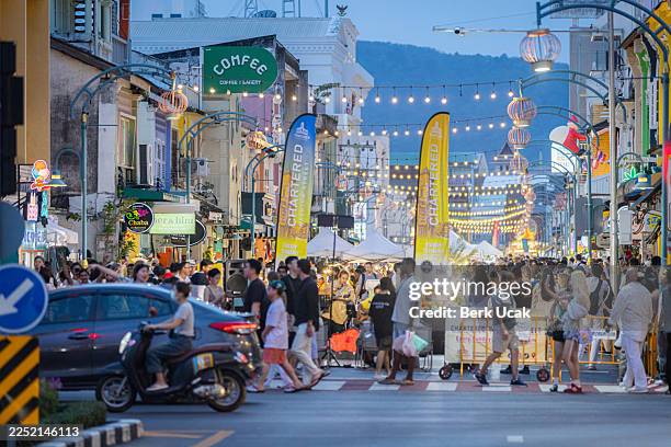 sunday walking street view at night. - phuket island stock pictures, royalty-free photos & images