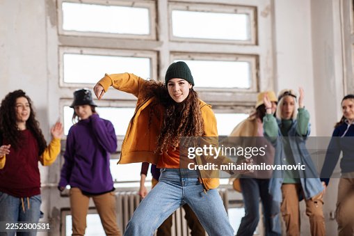 Young dancers perform a dynamic group dance routine Young dancers perform a dynamic group dance routine
