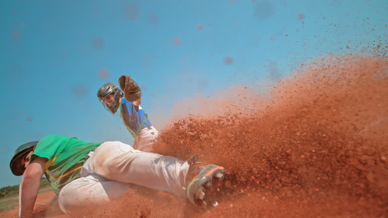 https://media.gettyimages.com/id/2252338409/video/dramatic-baseball-catcher-tags-runner-during-intense-home-plate-slide.jpg?b=1&s=640x640&k=20&c=JcGBUMWNOSsSVroqCFAaN6WOHzm1apqJFtL45ZmX8EY=