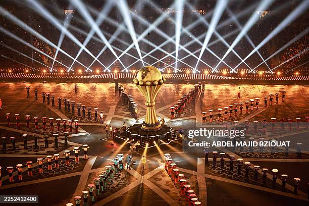 Dancers perform during the opening ceremony of the Africa Cup of Nations , prior to the Group A football match between Morocco and Comoros at Prince...