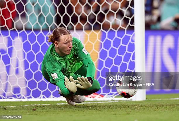 Matvey Safonov of Paris Saint-Germain saves from Pedro of CR Flamengo in the penalty shoot out during the FIFA Intercontinental Cup 2025 final match...