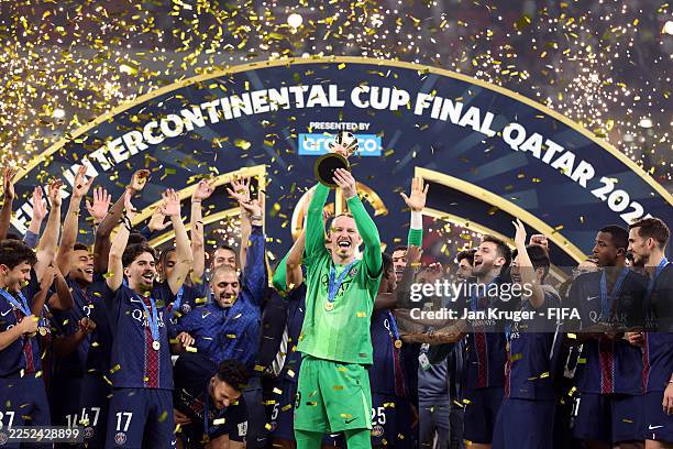 Matvey Safonov of Paris Saint-Germain lifts the trophy after winning the FIFA Intercontinental Cup 2025 final match between Paris Saint-Germain and...