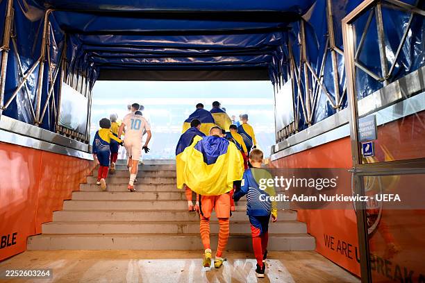 Players of Shamrock Rovers walk out of the tunnel whilst wearing a Ukraine flag prior to the UEFA Conference League 2025/26 League Phase MD6 match...