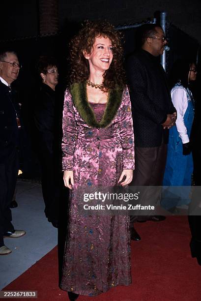 American actress and comedian Kathy Griffin, wearing a purple coat with a green fur collar, attends the 8th Billboard Music Awards, at the MGM Grand...
