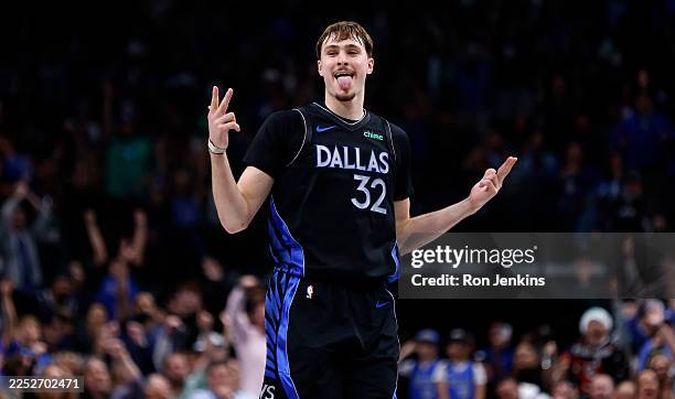 Cooper Flagg of the Dallas Mavericks reacts after scoring a three point basket during the second half against the Denver Nuggets at American Airlines...